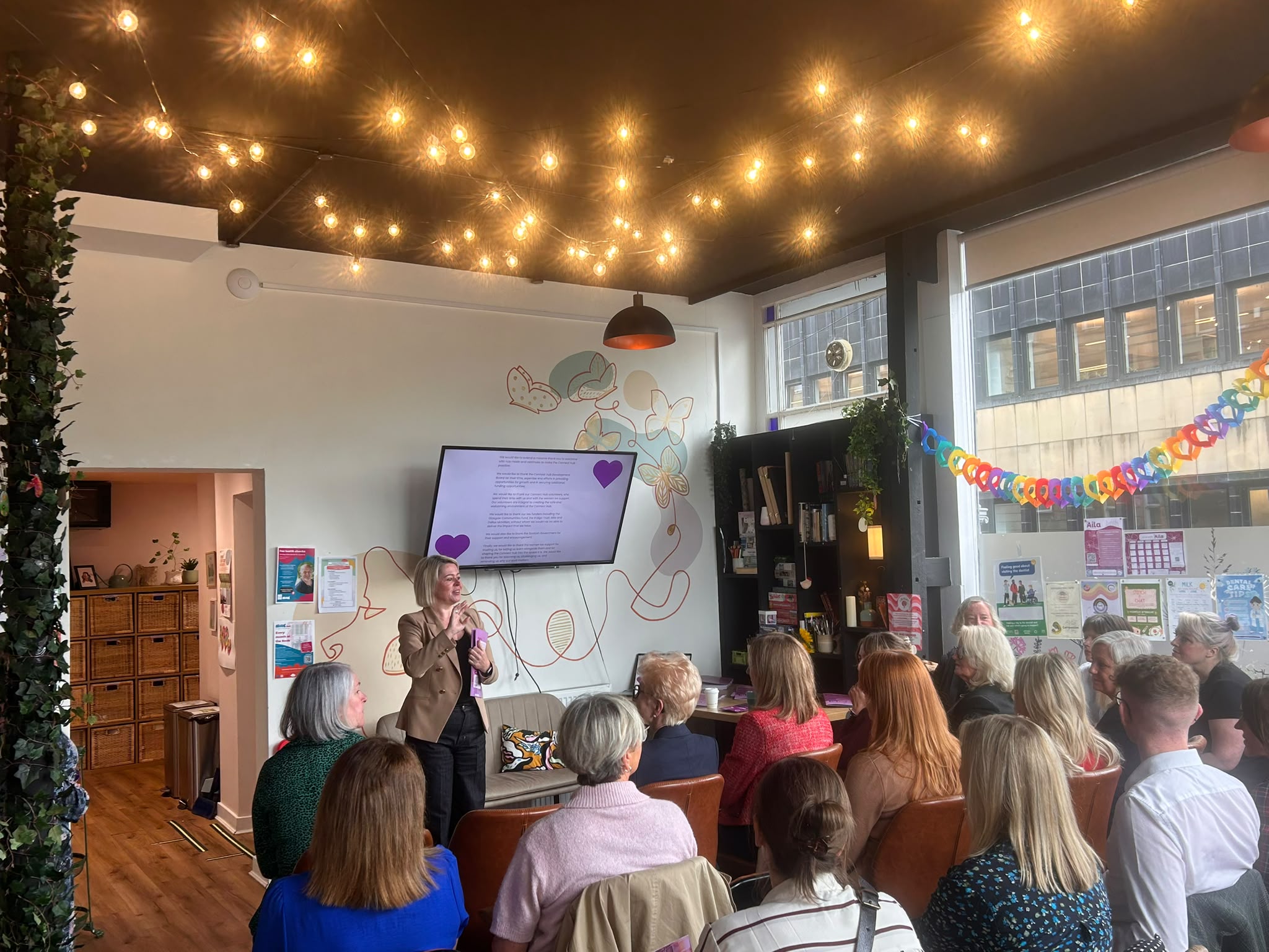 Debbie Shields presenting our Year 2 Impact Report at the Connect Hub